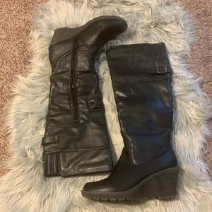 Bucco Wedge heel boots